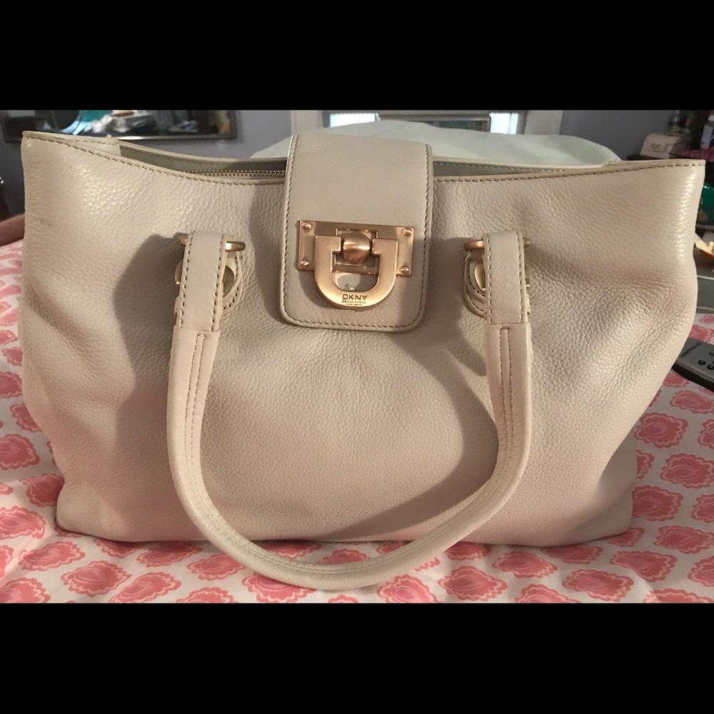 Great DKNY. Comes with crossbody strap also! Nwot